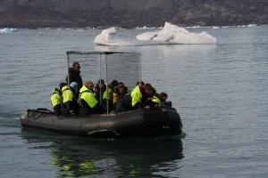 a boat with students and equipment arrives on Storholmen